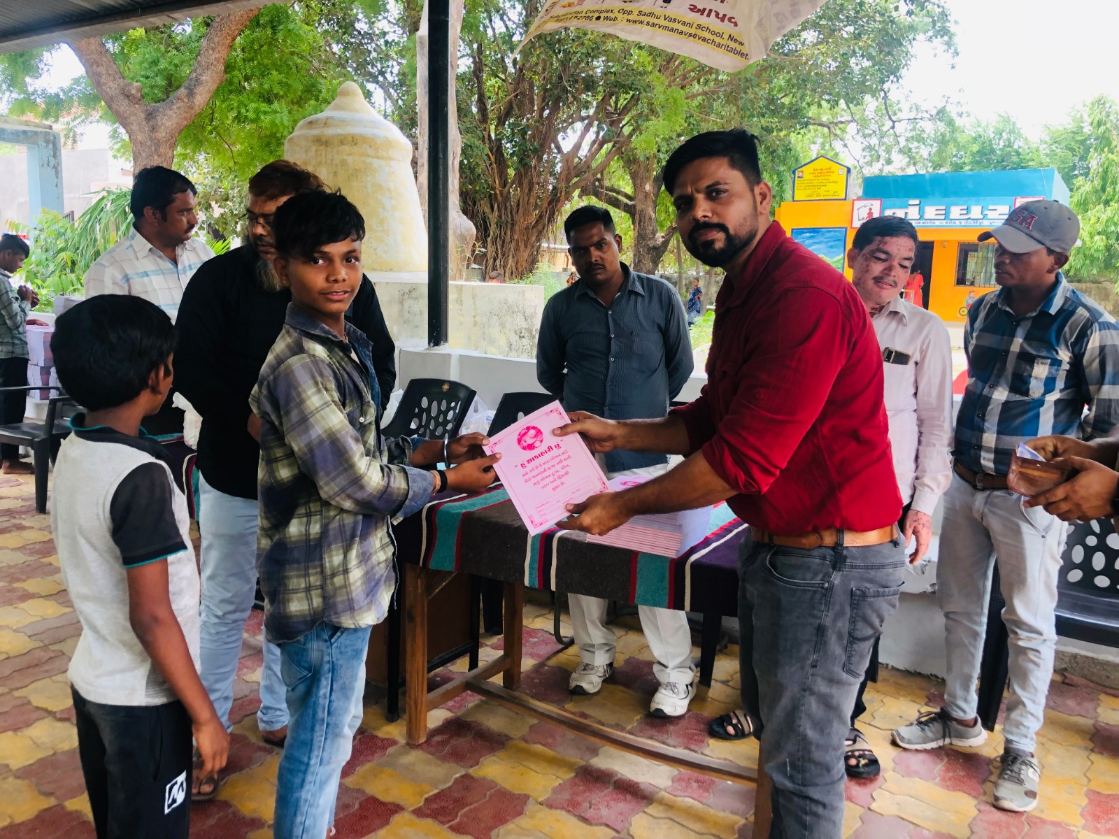 Education – children showing notebooks